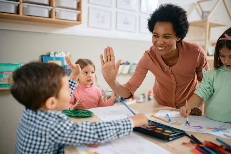 Preschool students engaged in STEM learning activities